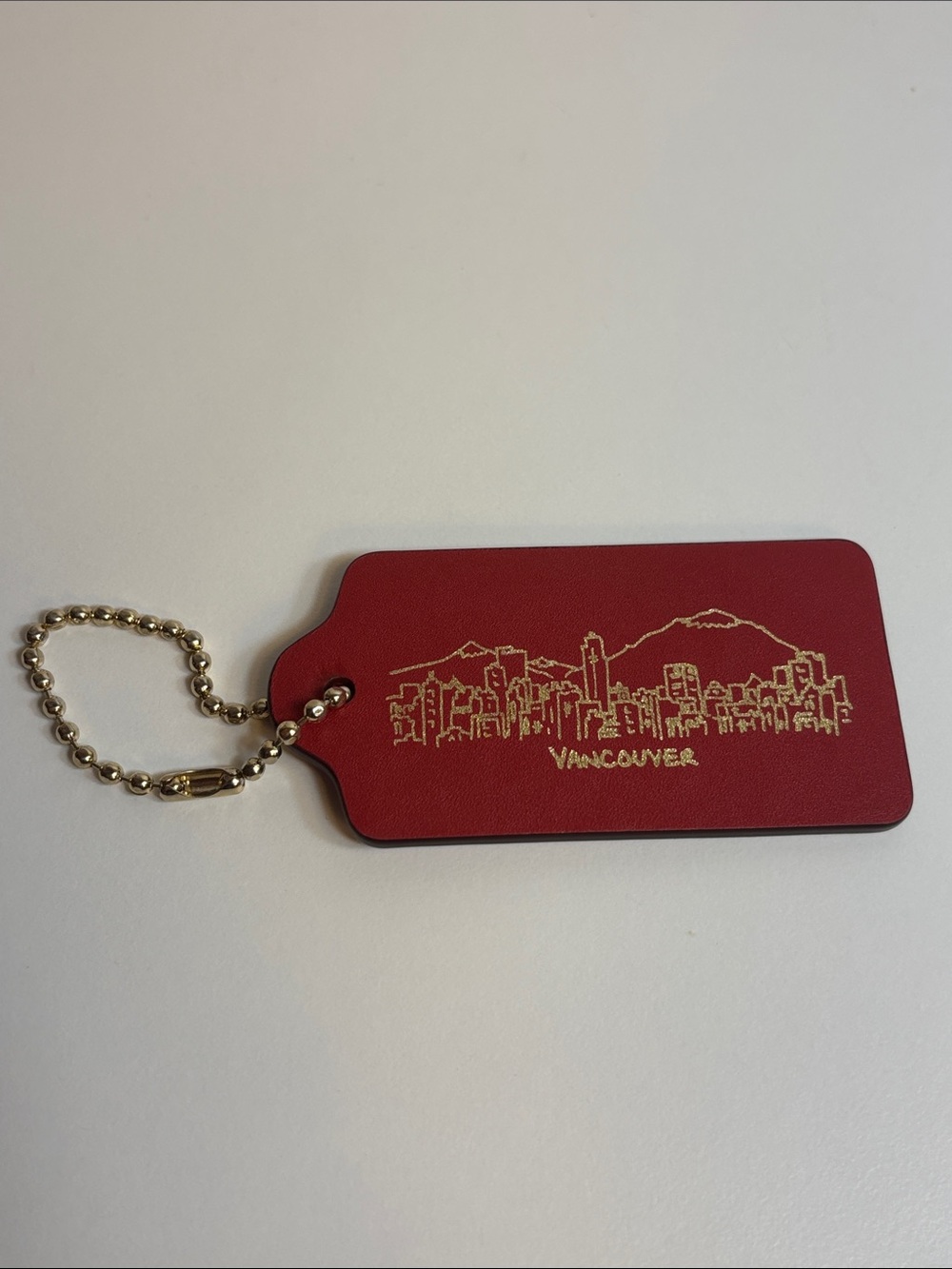 Coach monogrammed Vancouver hang tag